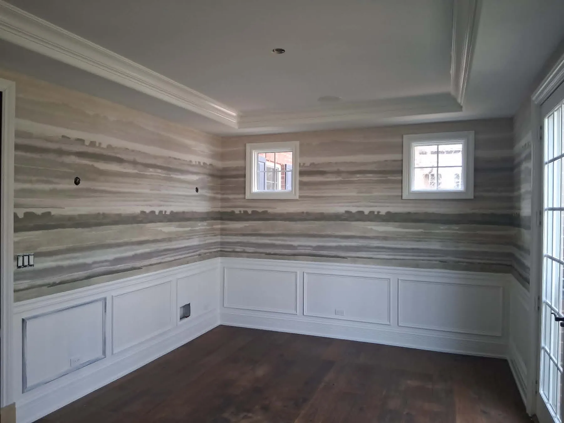 Custom interior renovation with detailed wall trim